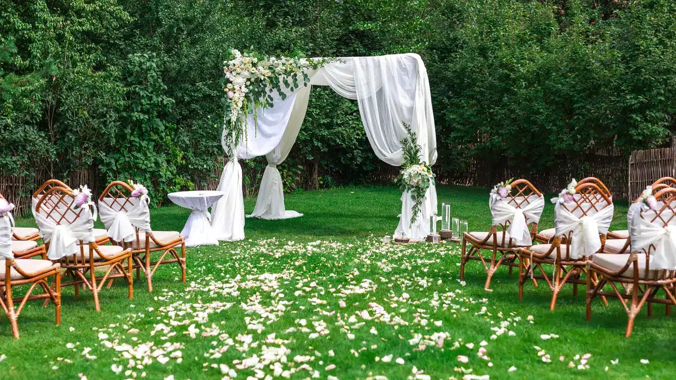 Wedding arch on green grass home page